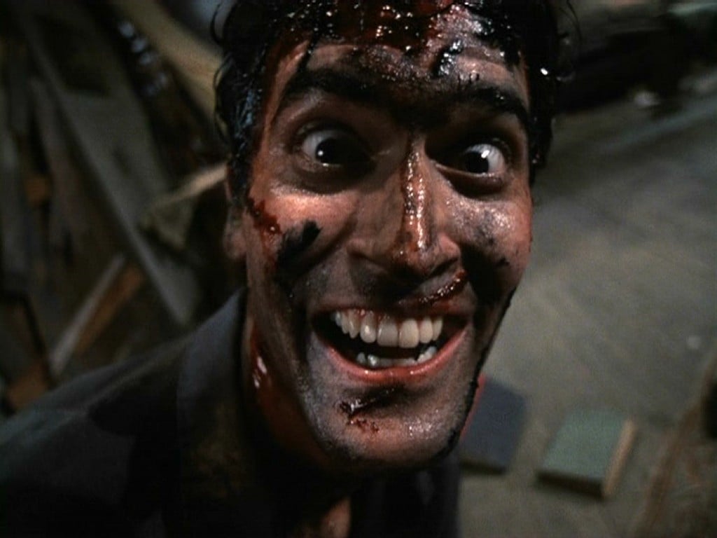 Ash Williams covered in blood in Evil Dead 2
