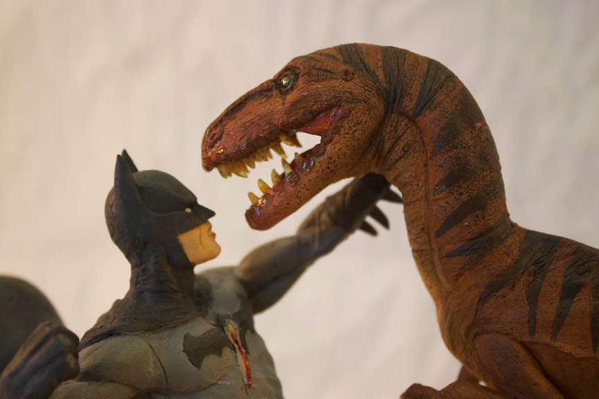 Batman Fighting A Dinosaur | The Mary Sue