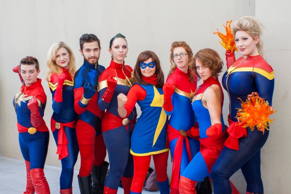 group of Captain Marvel and Ms. Marvel cosplayers