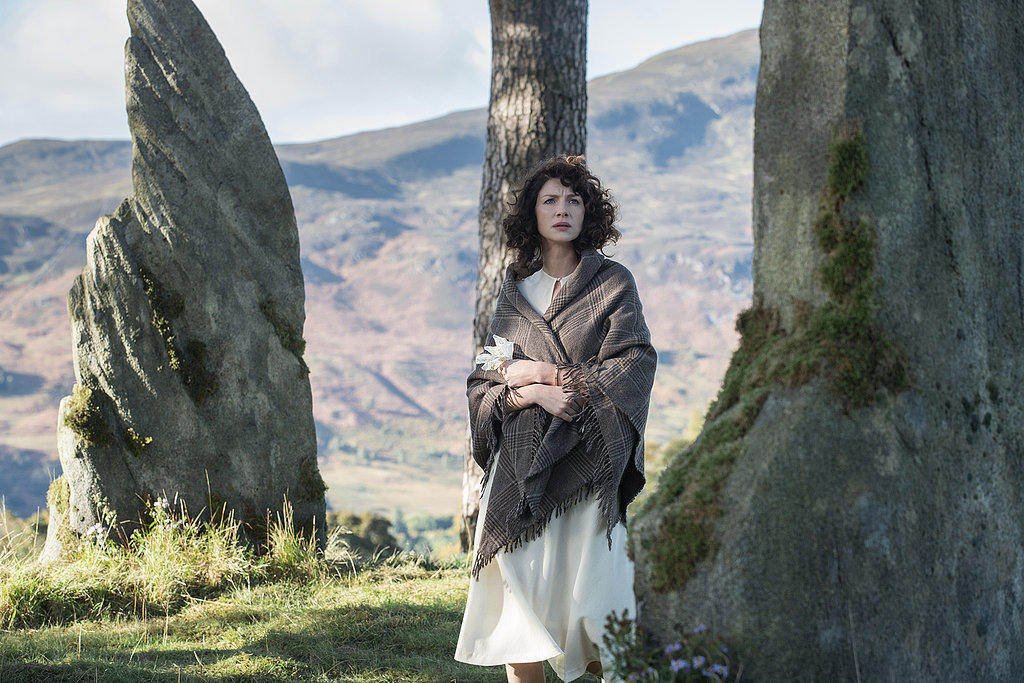 Claire (Caitriona Balfe) stands among a circle of stones in 'Outlander'