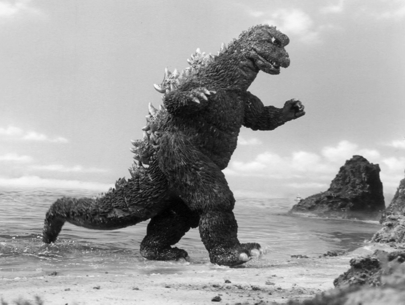 https://www.themarysue.com/wp-content/uploads/2015/06/Godzilla-9.gif