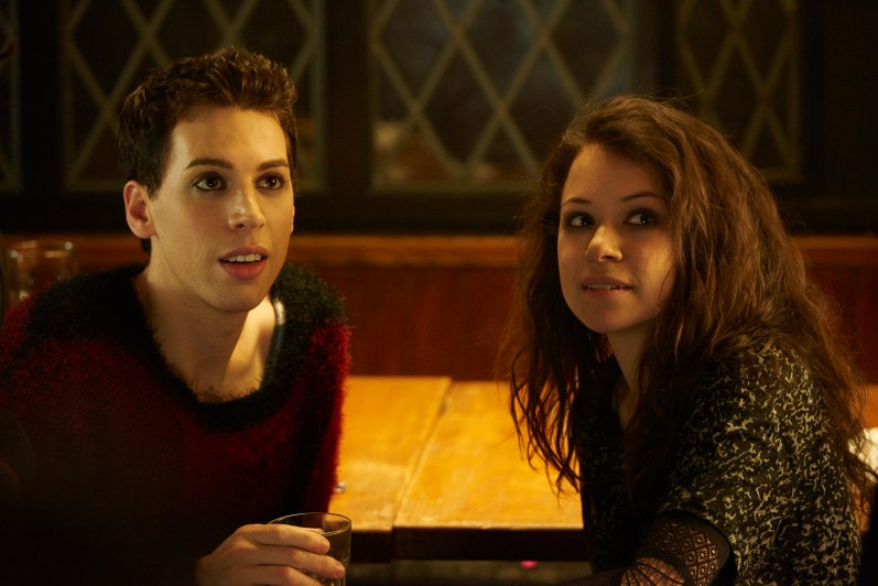 Sarah (TATIANA MASLANY) and Felix (JORDAN GAVARIS)