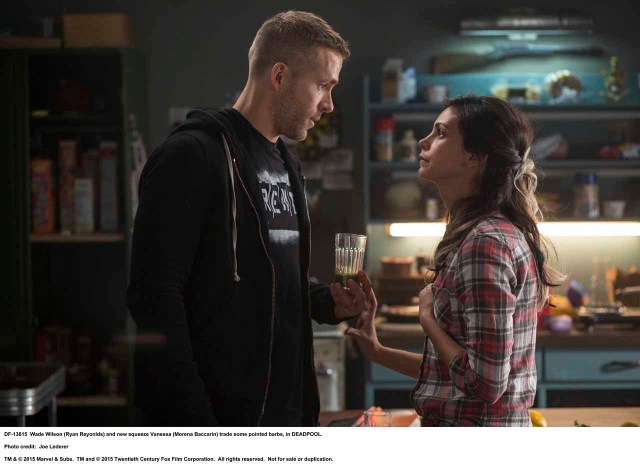 DEADPOOL Wade Wilson (Ryan Reyonlds) and new squeeze Vanessa (Morena Baccarin) trade some pointed barbs, in DEADPOOL. Photo Credit: Joe Lederer TM & © 2015 Marvel & Subs.  TM and © 2015 Twentieth Century Fox Film Corporation.  All rights reserved.  Not for sale or duplication.