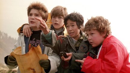 The cast of 'The Goonies' in a still from the classic film