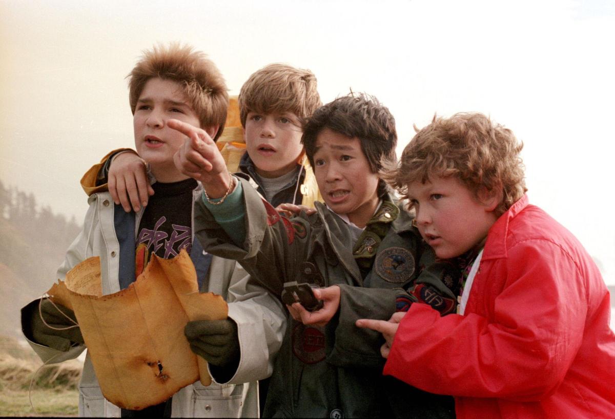 The cast of 'The Goonies' in a still from the classic film