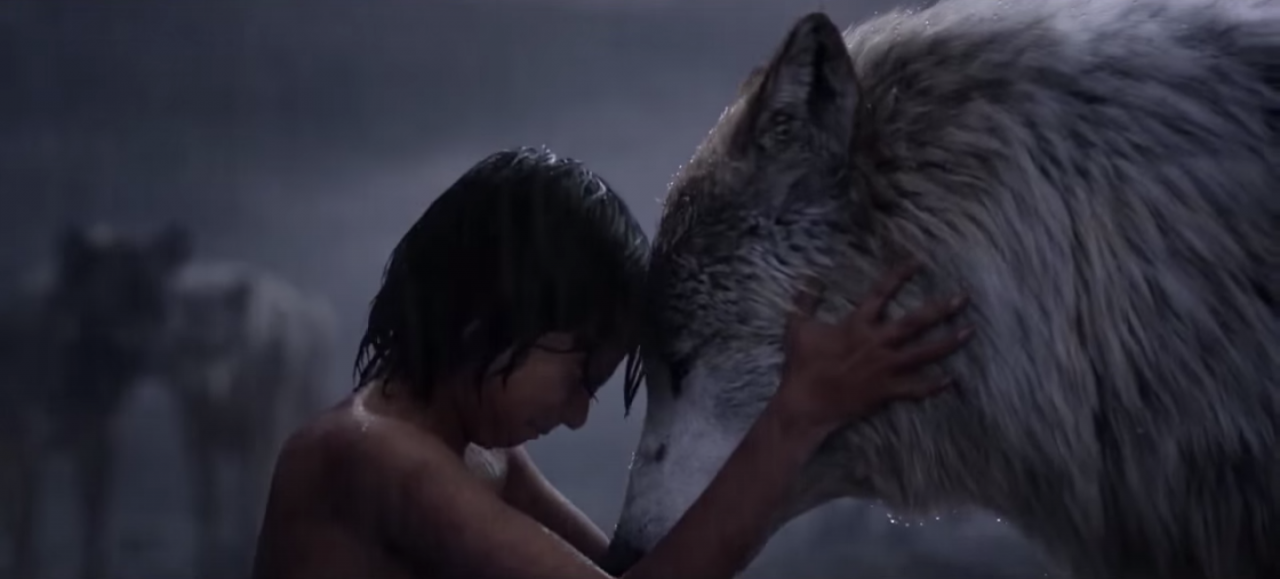 Mowgli with his wolf mother in the live-action Jungle Book