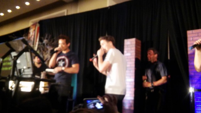 Osric Chau, rapping at the Karaoke Party.