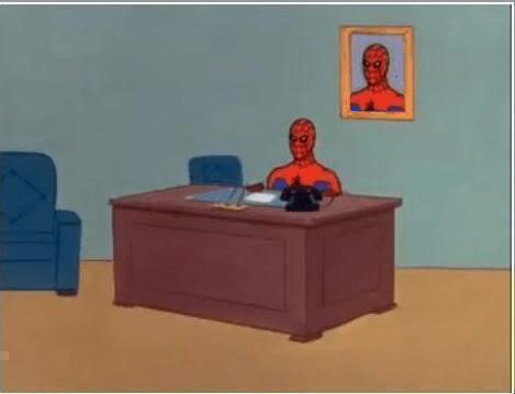 Spiderman at a desk