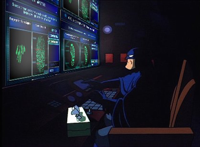Batman uses the batcomputer in Batman: The Animated Series.