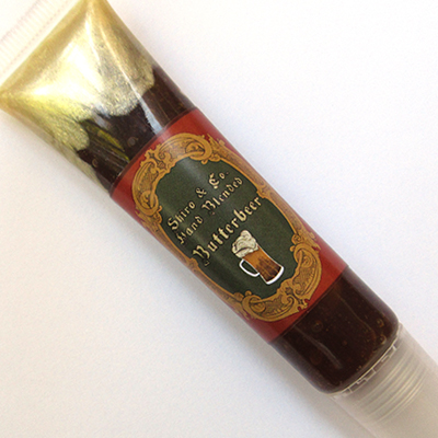 HAND-CRAFTED BUTTERBEER LIP GLOSS, Y'ALL.