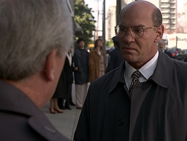 "I got some bad information from my lieutenant about a man hanging off your balcony"