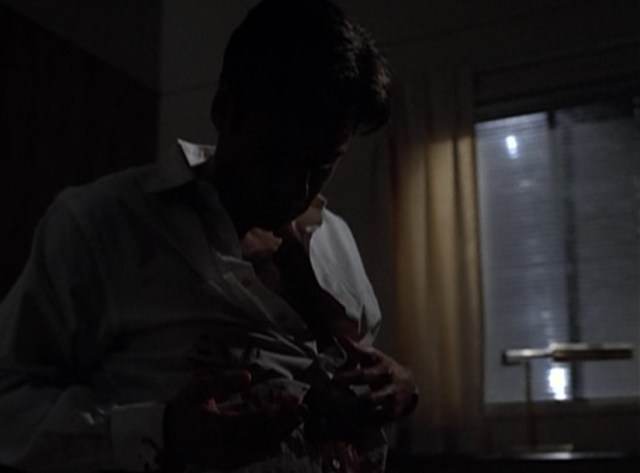Mulder - bloodied