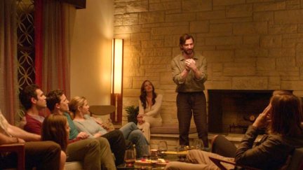 The Invitation characters in a room together