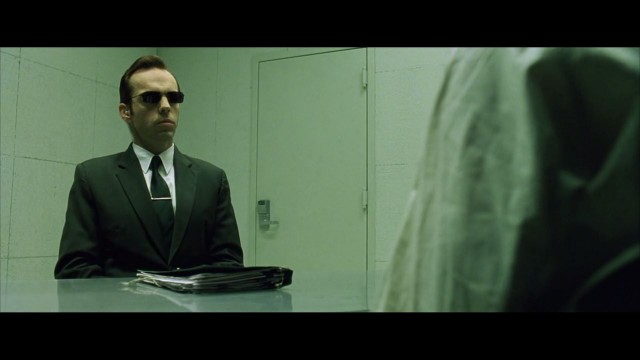 Agent Smith interrogates Neo