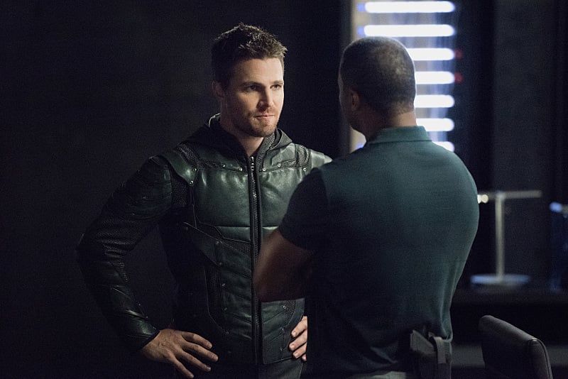 Arrow -- "Human Target" -- Image AR505a_0014.jpg -- Pictured (L-R): Stephen Amell as Oliver Queen/The Green Arrow and David Ramsey as John Diggle -- Photo: Dean Buscher/The CW -- ÃÂ© 2016 The CW Network, LLC. All Rights Reserved.
