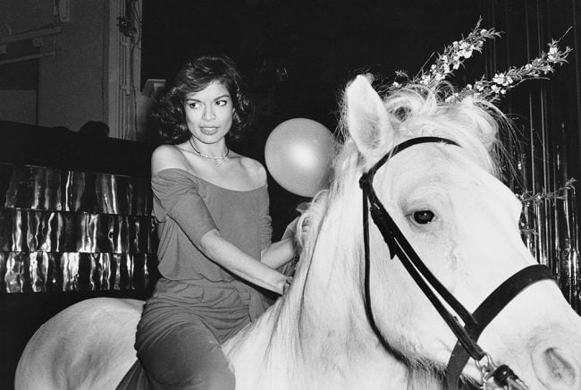 Bianca Jagger on a white horse that happened to be inside Studio 54 on her birthday in 1977. This iconic photo was taken by Rose Hartman, subject of Otis Mass' documentary The Incomparable Rose Hartman, screening at the 2016 Bentonville Film Festival. PHOTO CREDIT: Rose Hartman / The Artists Company