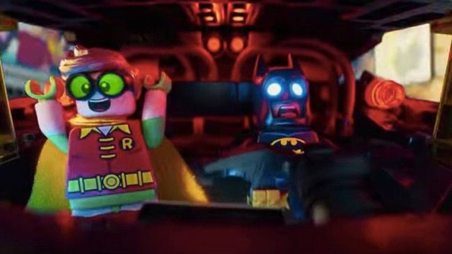 Lego Batman screaming as Lego Robin cheers