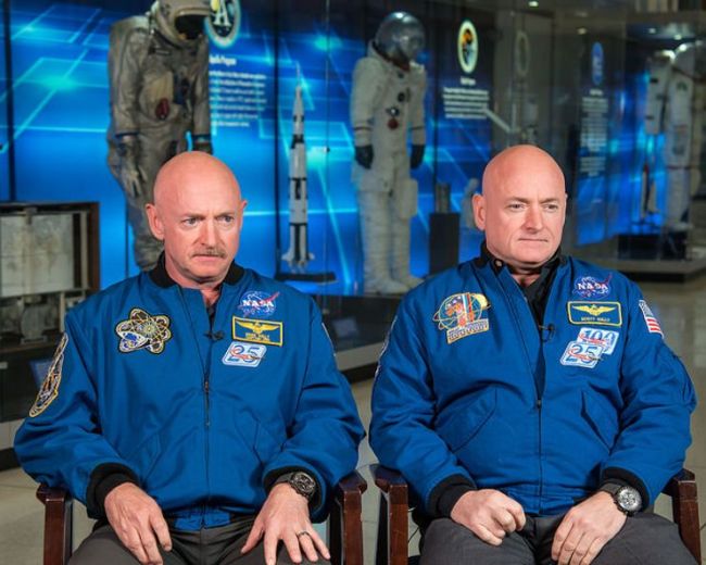 Brothers Mark Kelly (with mustache) and Scott Kelly. Photo Credit: NASA Johnson/Flickr (CC)