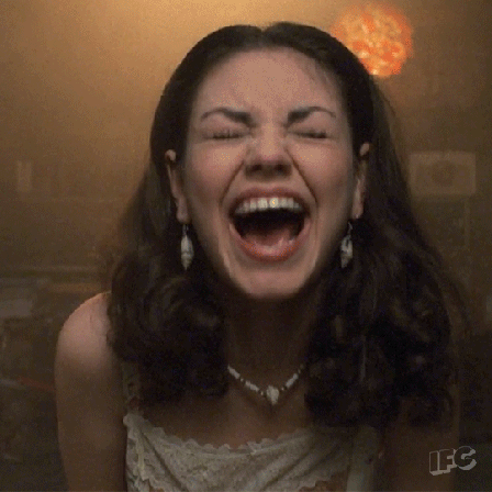 mila kunis laughing