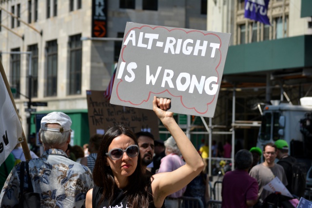  People holding signs supporting Islam to protest a march against Sharia in Lower Manhattan in 2017.