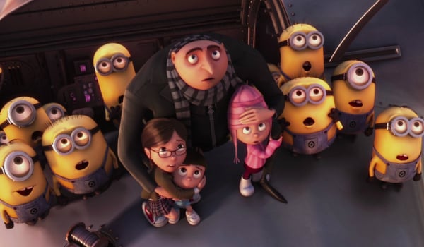 Gru holding Edith, Margo, and Agnes to him