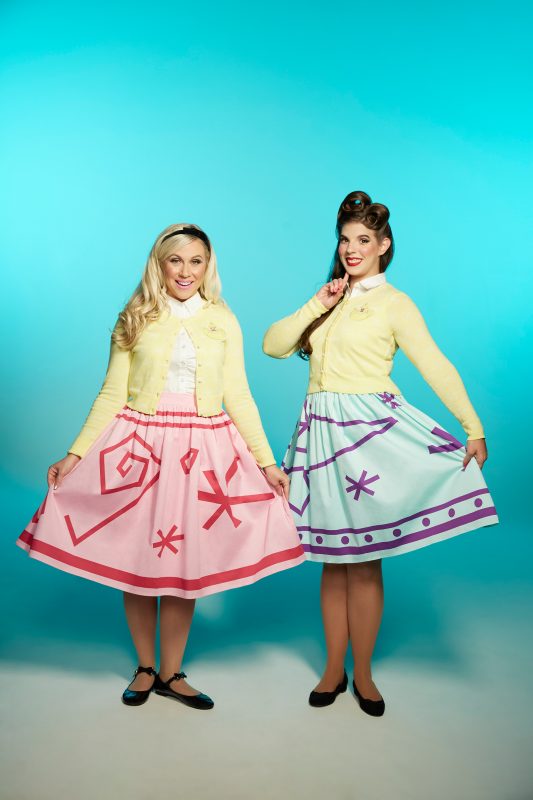 image: Her Universe Ashley Eckstein and model in Disney Teacup skirts