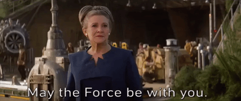 Giphy of Carrie Fisher as Leia saying, "May the Force be with you."