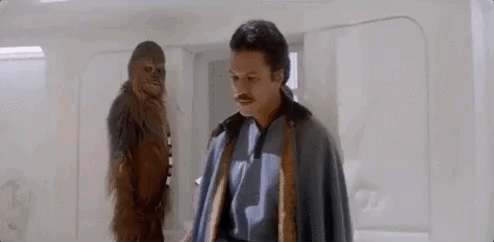 Lando Calrissian walks away from a busted C3PO