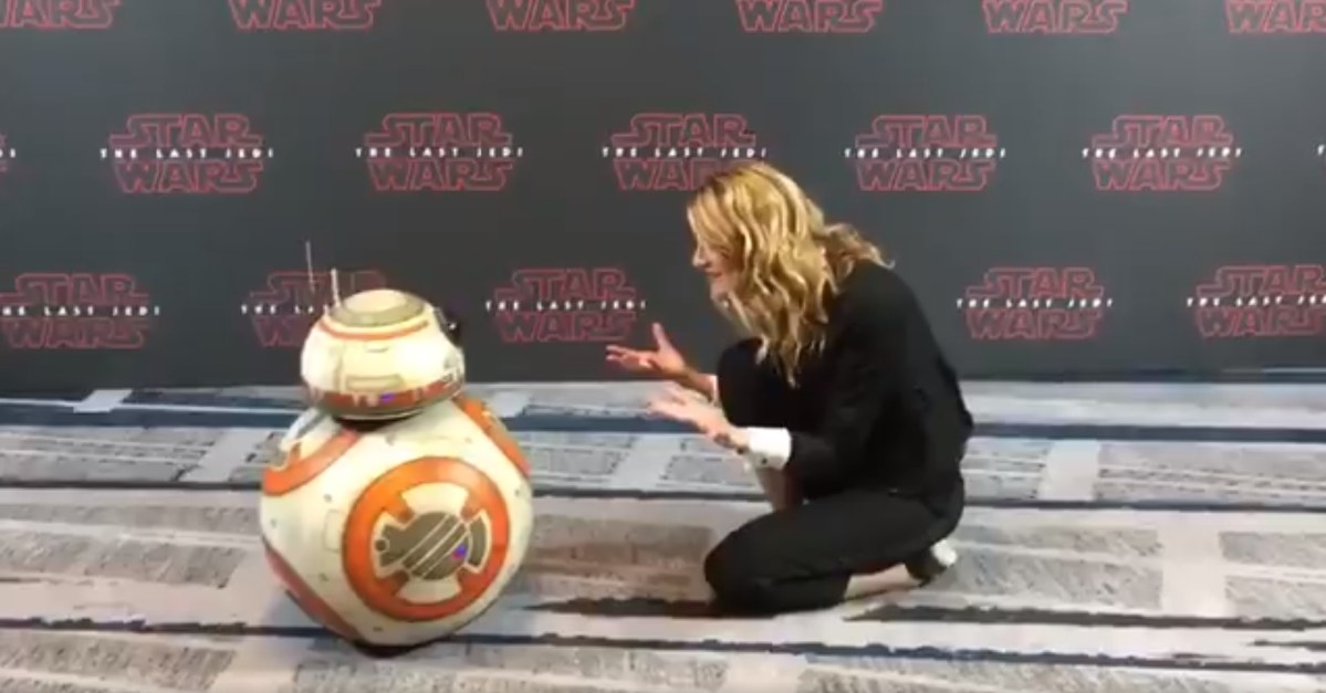 image: screencap Laura Dern and BB-8 at a press conference for Star Wars: The Last Jedi