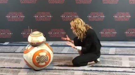image: screencap Laura Dern and BB-8 at a press conference for Star Wars: The Last Jedi