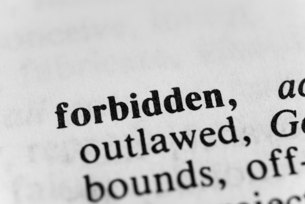 Shutterstock image of the dictionary definition of "forbidden" 
