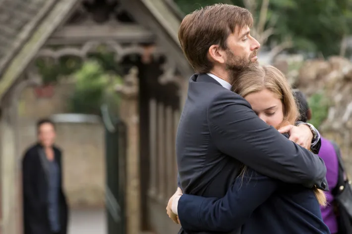 David Tennant as Hardy hugs daughter in Broadchurch