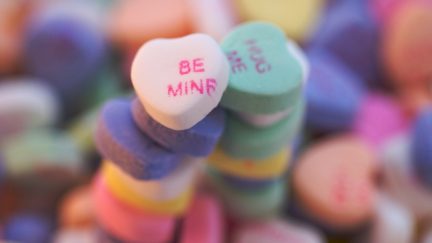 Image of candy hearts that say, 