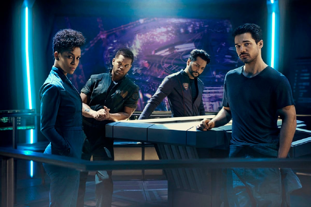 Image of "The Expanse," featuring Dominique Tipper as Naomi Nagata, Wes Chatham as Amos Burton, Cas Anvar as Alex Kamal, and Steven Strait as James Holden (Photo credit: Kurt Iswarienko / Syfy)