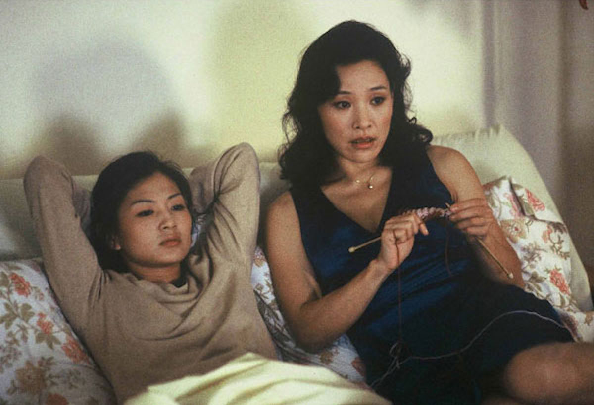 Michelle Krusiec and Joan Chen sit on a couch in 'Saving Face'.