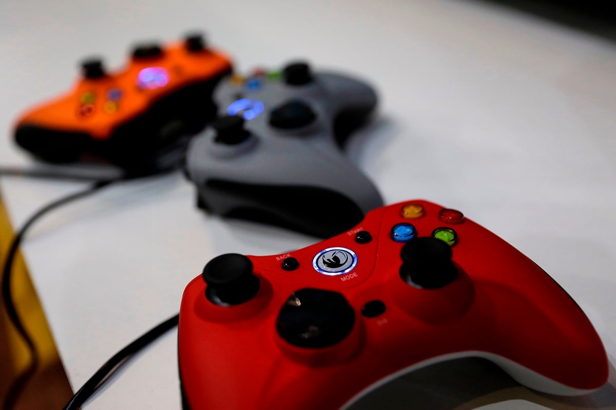 Microsoft Xbox video game controllers (Credit: THOMAS SAMSON/AFP/Getty Images)