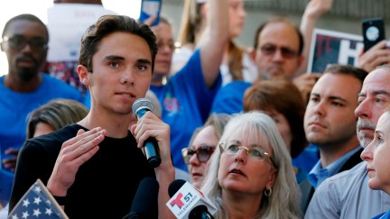 Marjory Stoneman Douglas High School student David Hogg speaking at a rally for gun control in Fort Lauderdale, Florida. (Photo credit: RHONA WISE/AFP/Getty Images)