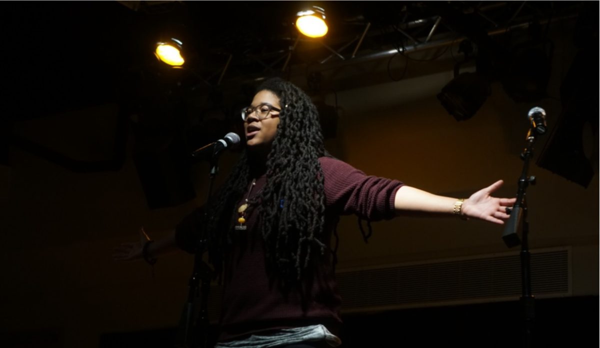 Spoken word poet Kai Davis in performance