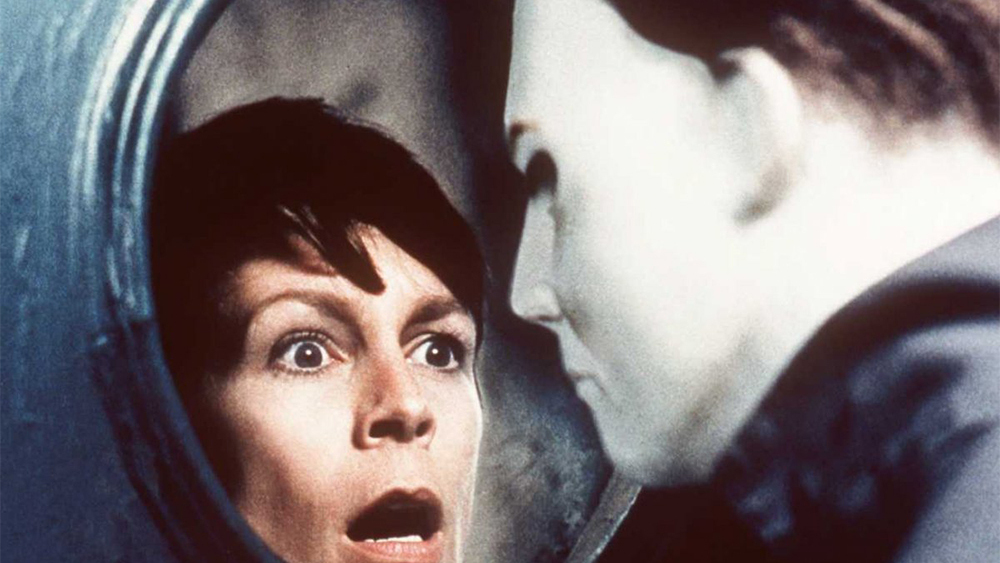 jamie lee curtis surprised by Michael Myers in Halloween