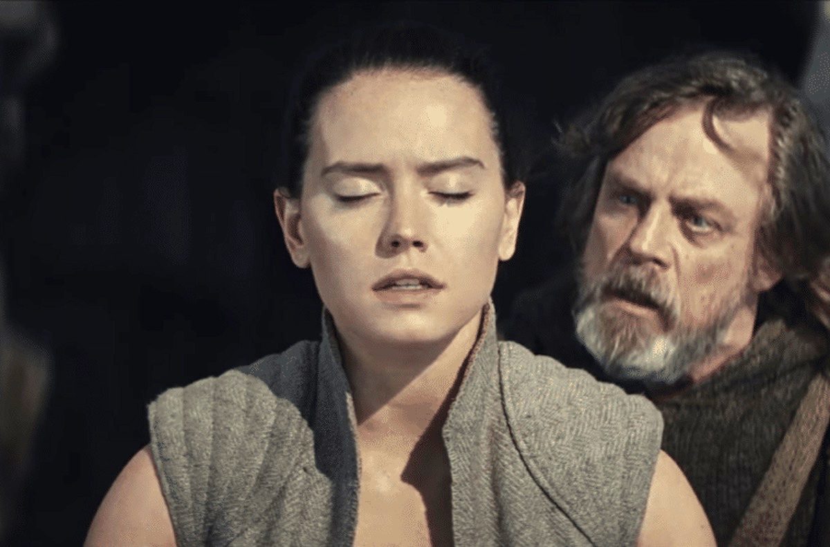 Daisy Ridley as Rey and Mark Hamill as Luke in Star Wars: The Last Jedi