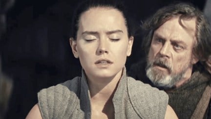 Daisy Ridley as Rey and Mark Hamill as Luke in Star Wars: The Last Jedi