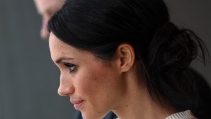 BELFAST, NORTHERN IRELAND - MARCH 23: Prince Harry and Meghan Markle during a visit to Titanic Belfast maritime museum on March 23, 2018 in Belfast, Nothern Ireland.