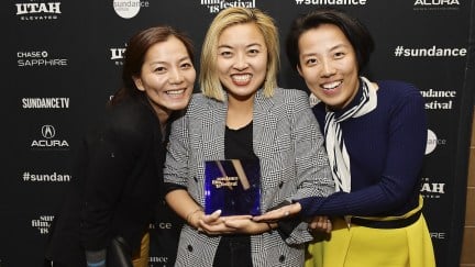 PARK CITY, UT - JANUARY 27: (L-R) Producer Jane Zheng, director Cathy Yan, and producer Clarissa Zhang backatage after accepting the Special Jury Award for Ensemble Acting for their film 