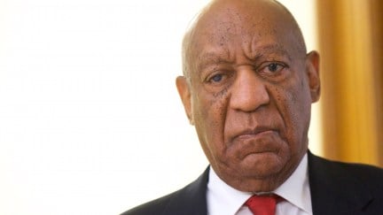 Bill Cosby frowns at the camera.