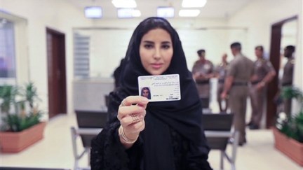 Esraa Albuti displays her new driving license in Riyadh, Saudi Arabia
