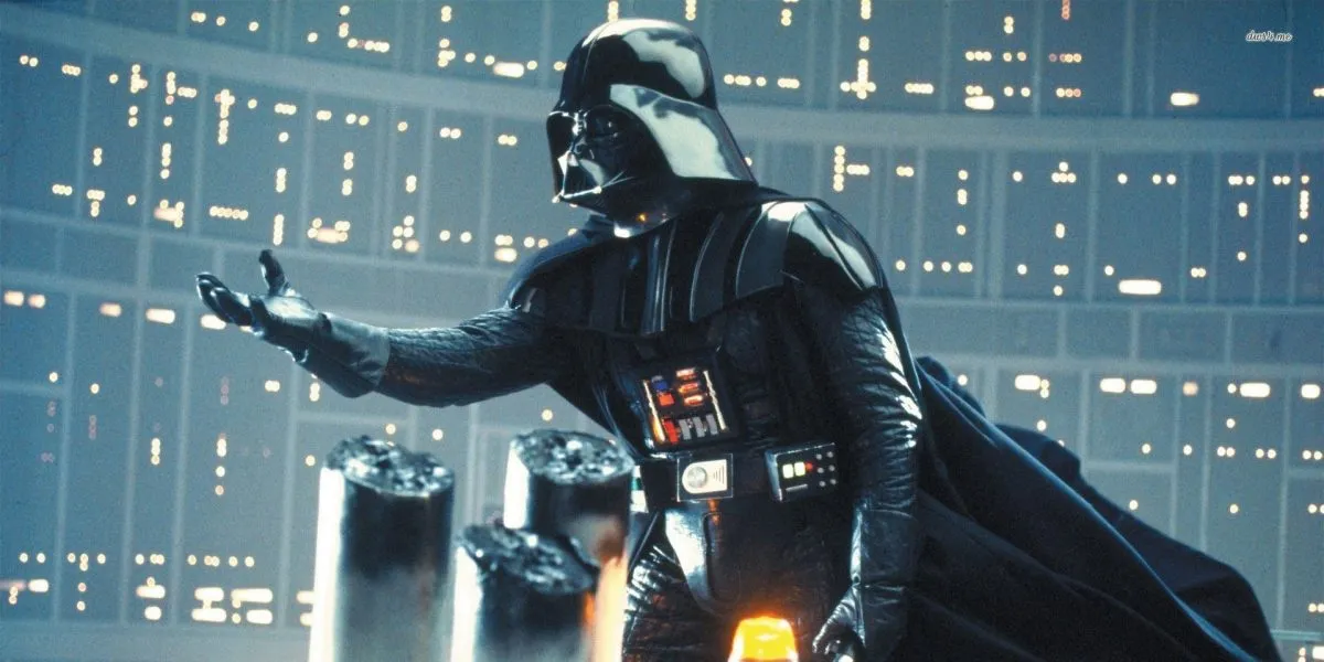 darth vader with hand outstretched to Luke in Star Wars: The Empire Strikes Back