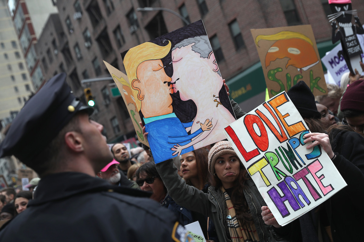 trump putin protest, homophobia, signs