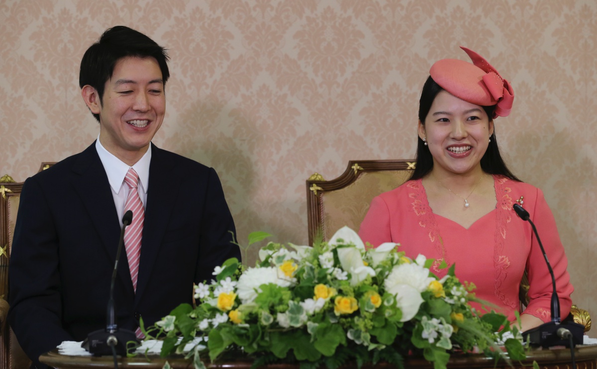 Japanese Princess Ayako (R), the third daughter of the late Prince Takamado, and her fiance Kei Moriya attend a press conference to announce their engagement at the Imperial Household Agency in Tokyo on July 2, 2018. (Photo by Koji Sasahara / POOL / AFP) (Photo credit should read KOJI SASAHARA/AFP/Getty Images)