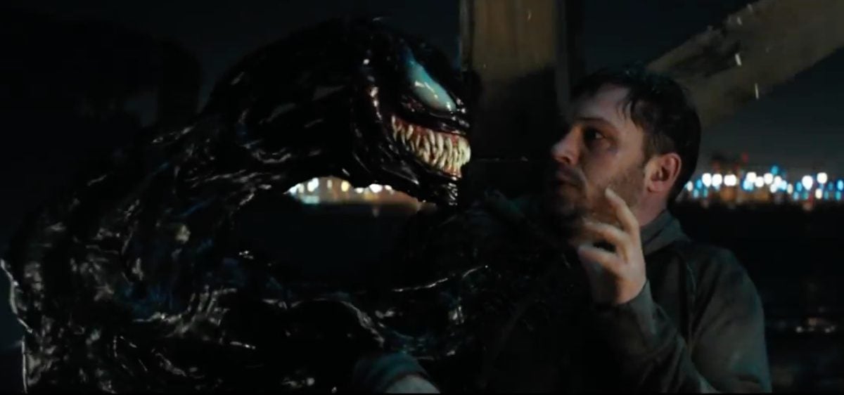 Venom menacing Eddie Brock in Venom movie.