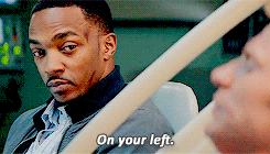 Sam Wilson (Anthony Mackie) waits for Steve Rogers (Chris Evans) to wake up in Captain America: The Winter Soldier